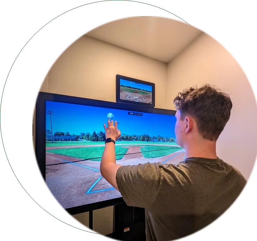 Athlete completing sports vision training on a digital trainer at Focal Point Vision in Fairhope AL